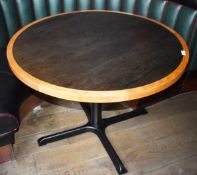 1 x Round Restaurant Table With a 105cm Diameter - Features a Two Tone Wooden Top and Cast Iron Base