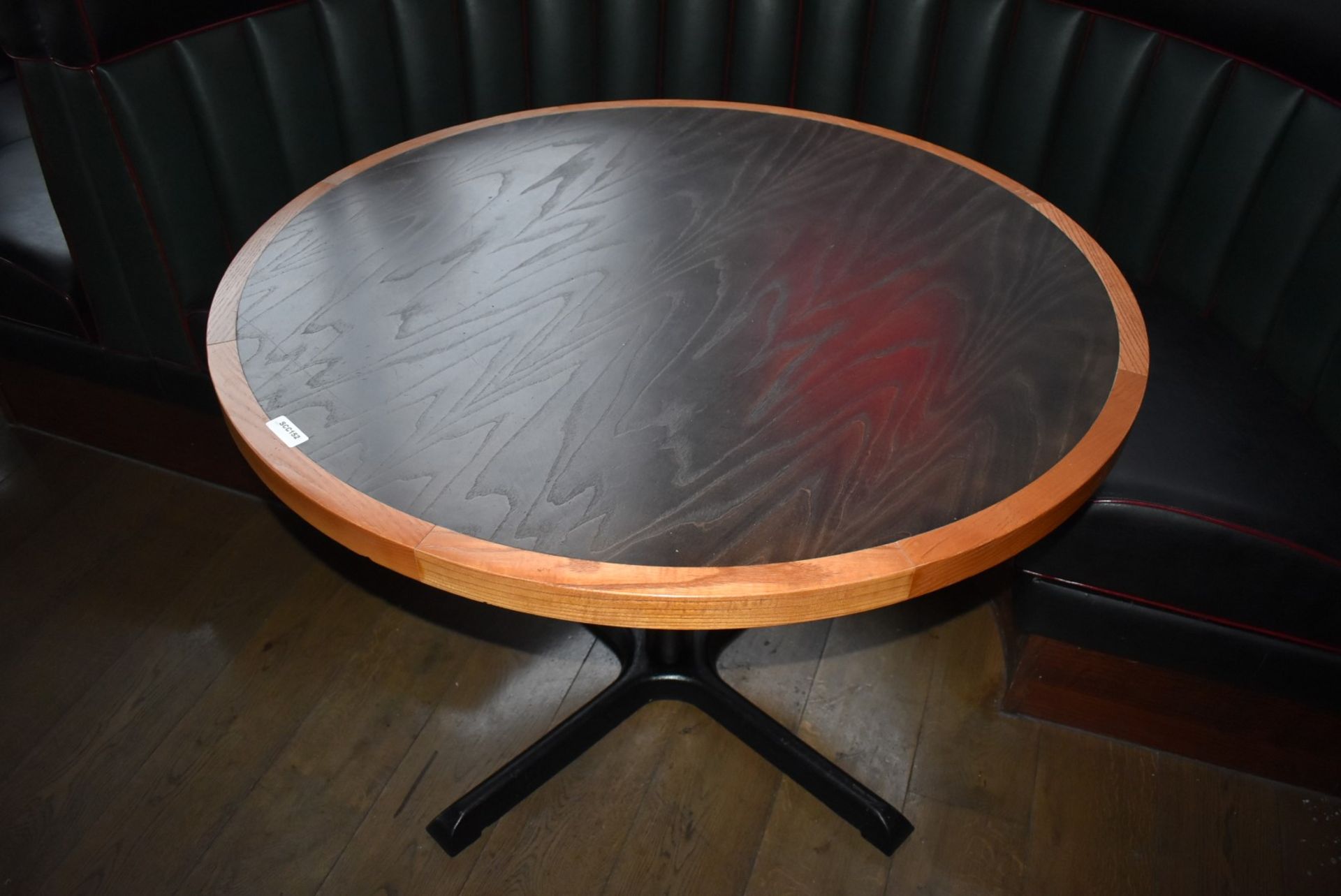 1 x Round Restaurant Table With a 105cm Diameter - Features a Two Tone Wooden Top and Cast Iron Base - Image 2 of 4