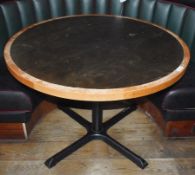 1 x Round Restaurant Table With a 105cm Diameter - Features a Two Tone Wooden Top and Cast Iron Base