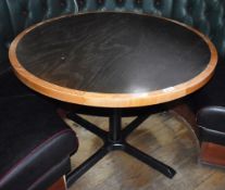 1 x Round Restaurant Table With a 105cm Diameter - Features a Two Tone Wooden Top and Cast Iron Base