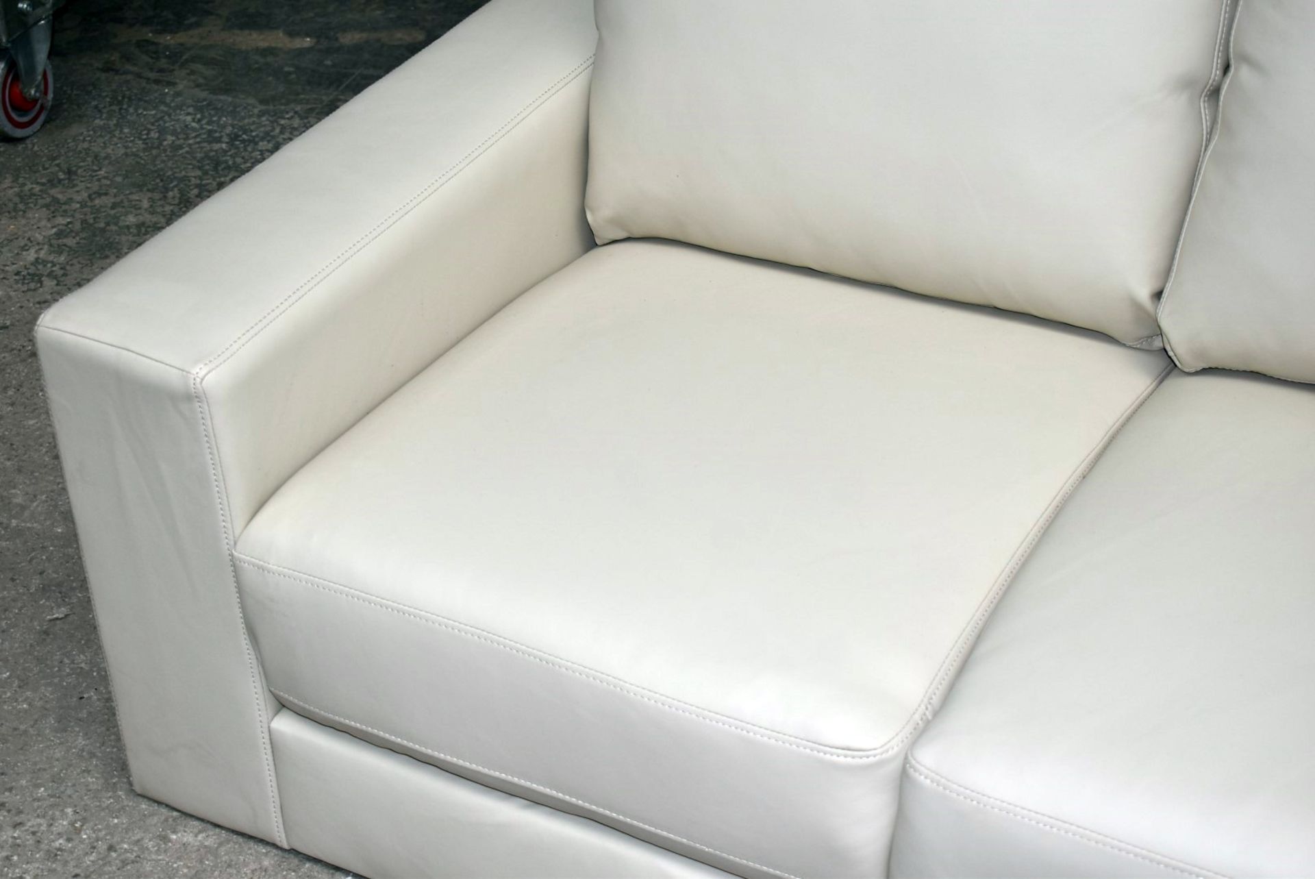 1 x Contemporary Two Seater Sofa in Faux Cream Leather - Ex Display - Dimensions: 146cm Width - Ref: - Image 2 of 8