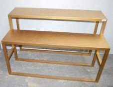 A Pair Of 1.2-Metre Long Wooden 2-Tier Display Units In A Painted Gold Finish - Dimensions: H75 x