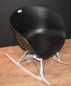 1 x Designer Inspired Rocking Tub Chair - Black ABS Plastic With Beech Rocking Base - New and Unused