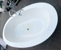 1 x Contemporary Porcelain Oval Bath With Mixer Tap and Shower Head.