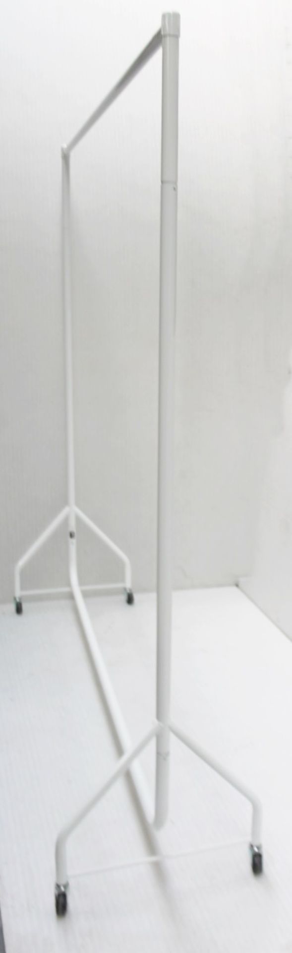 A Pair Of Tall Garment Rails In White - Recently Removed From A Designer Bridal Boutique