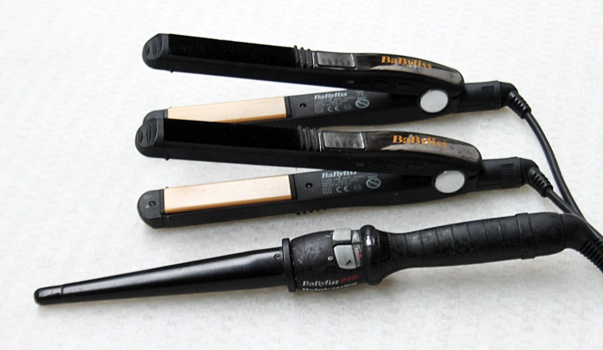2 x Pairs Of Babyliss Hair Straighteners And 1 x Babyliss Pro Conical Wand - Recently Removed From A