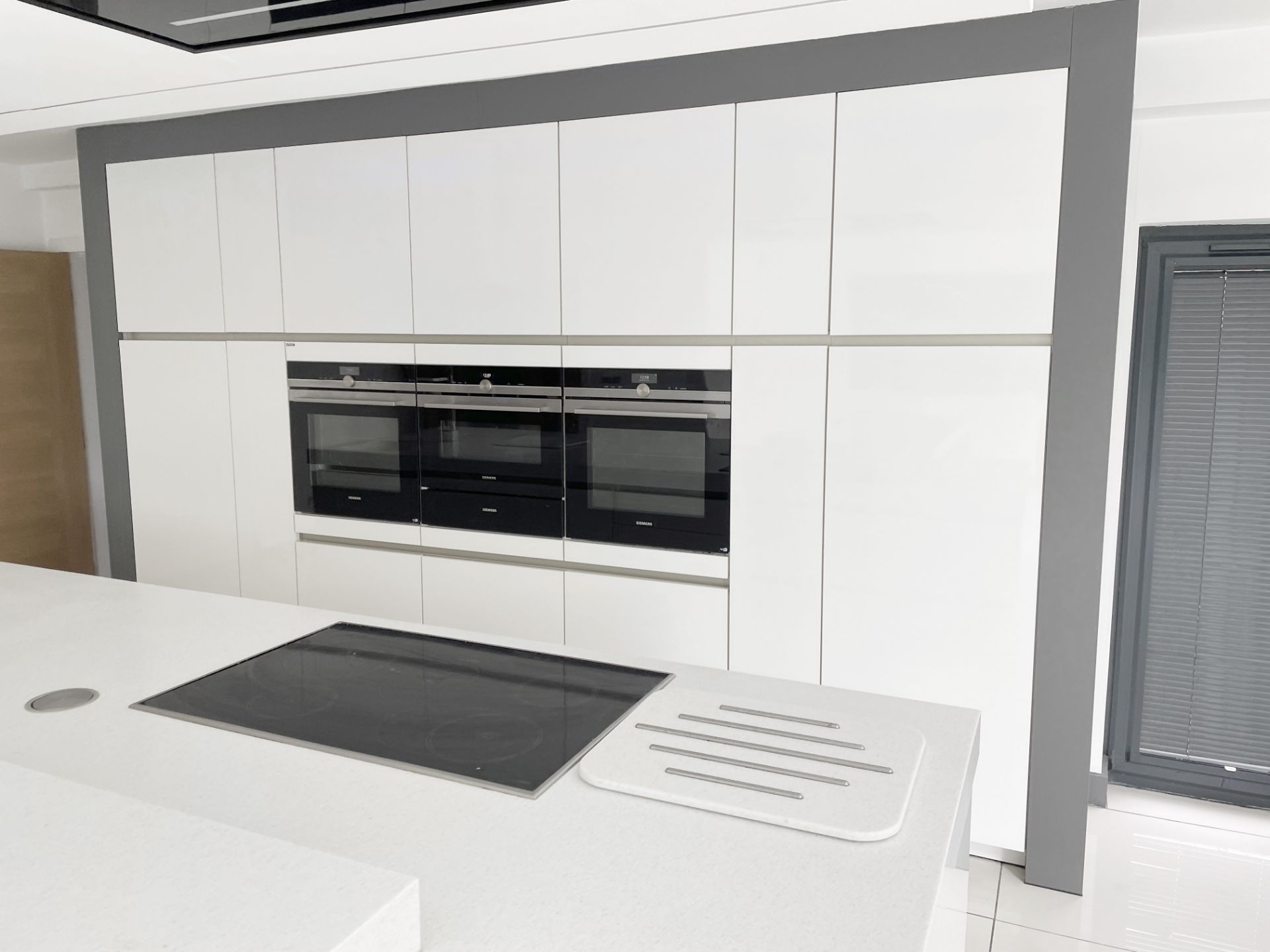 1 x SieMatic Contemporary Fitted Kitchen With Branded Appliances, Central Island + Corian Worktops - Image 5 of 100