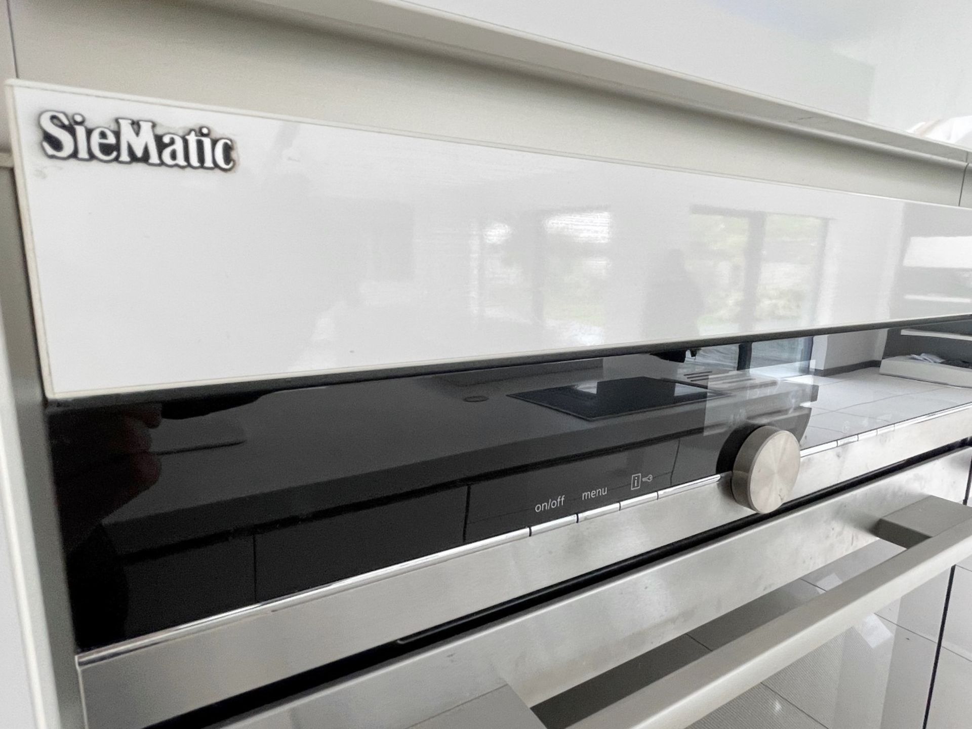 1 x SieMatic Contemporary Fitted Kitchen With Branded Appliances, Central Island + Corian Worktops - Image 61 of 100