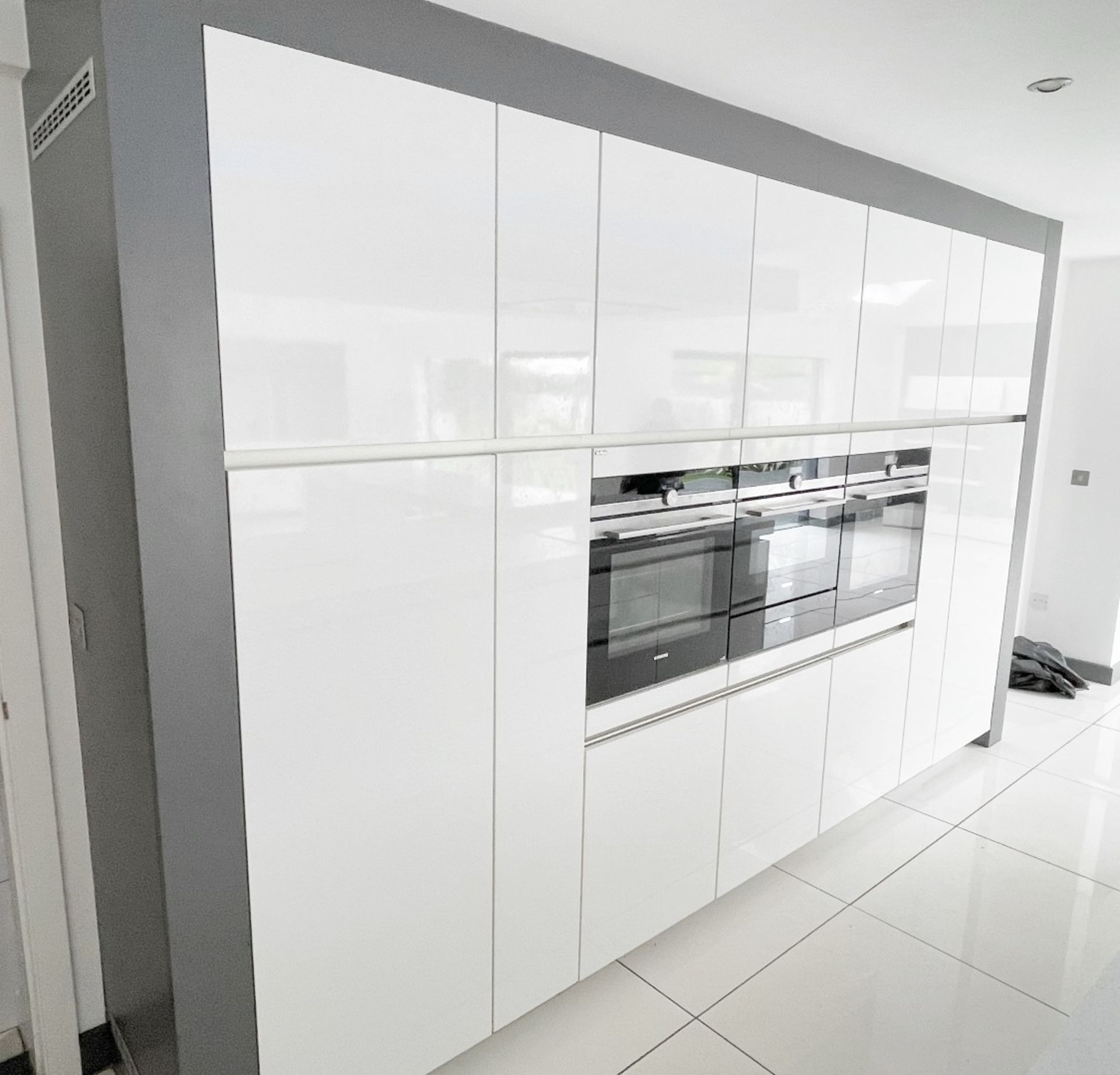 1 x SieMatic Contemporary Fitted Kitchen With Branded Appliances, Central Island + Corian Worktops - Image 55 of 100