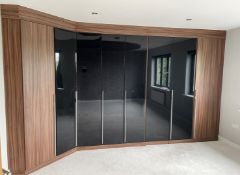 Bank Of Premium Bespoke Fitted Wardrobes With Black Glass Door Frontage - Approx. 4-Metres In Length