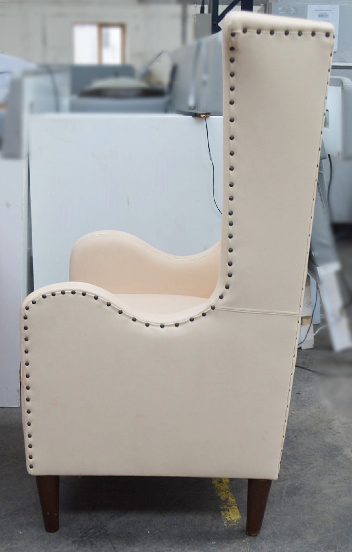 1 x Large Commercial Wing-Back Armchair In A Peach Leather With Studded Detailing - Professionally - Image 6 of 7