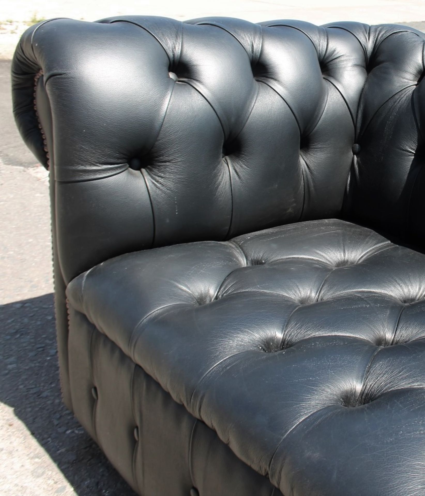 1 x Chesterfield-style 2-Metre Button-Back Sofa Upholstered In A Black Faux Leather - Image 5 of 6