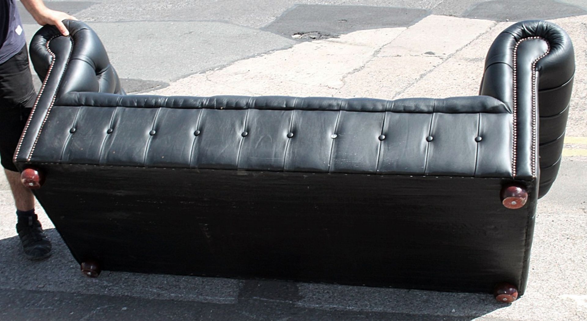 1 x Chesterfield-style 2-Metre Button-Back Sofa Upholstered In A Black Faux Leather - Image 2 of 6