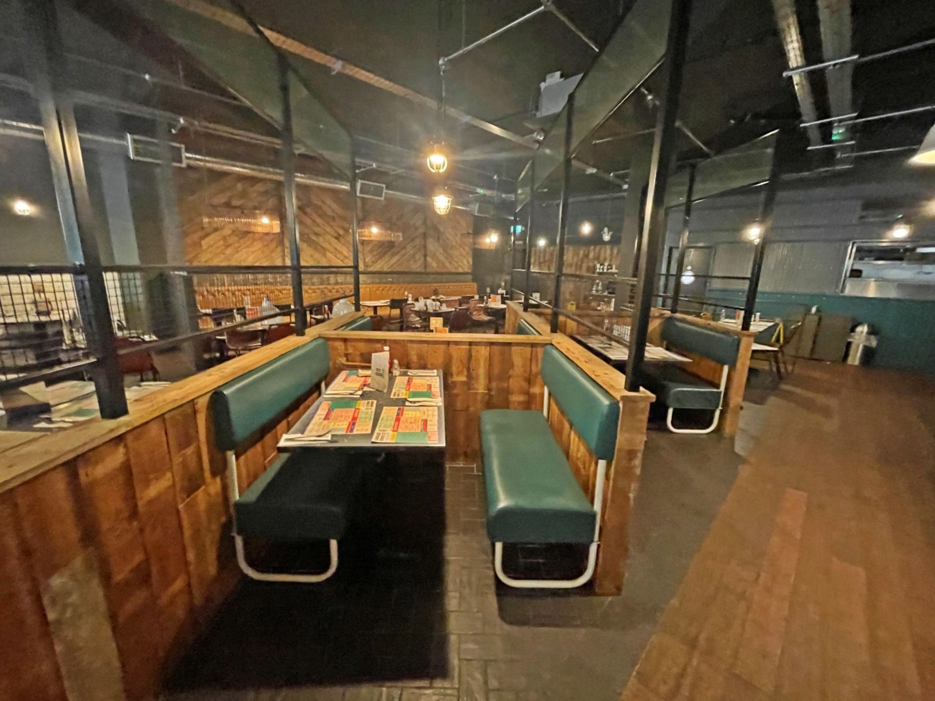 Large Seating Booth Area Featuring Rustic Wood Dividers Under Industrial Style Height Extenders - Image 22 of 27