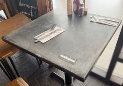 4 x Restaurant Dining Tables Featuring Cast Iron Bases and Stone Effect Tops