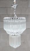 1 x NOVARESI Luxury 4-Tier Pendant Chandelier Adorned With Exquisite Cut Murano Glass Droplets