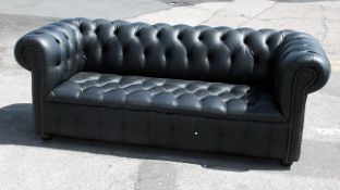 1 x Chesterfield-style 2-Metre Button-Back Sofa Upholstered In A Black Faux Leather