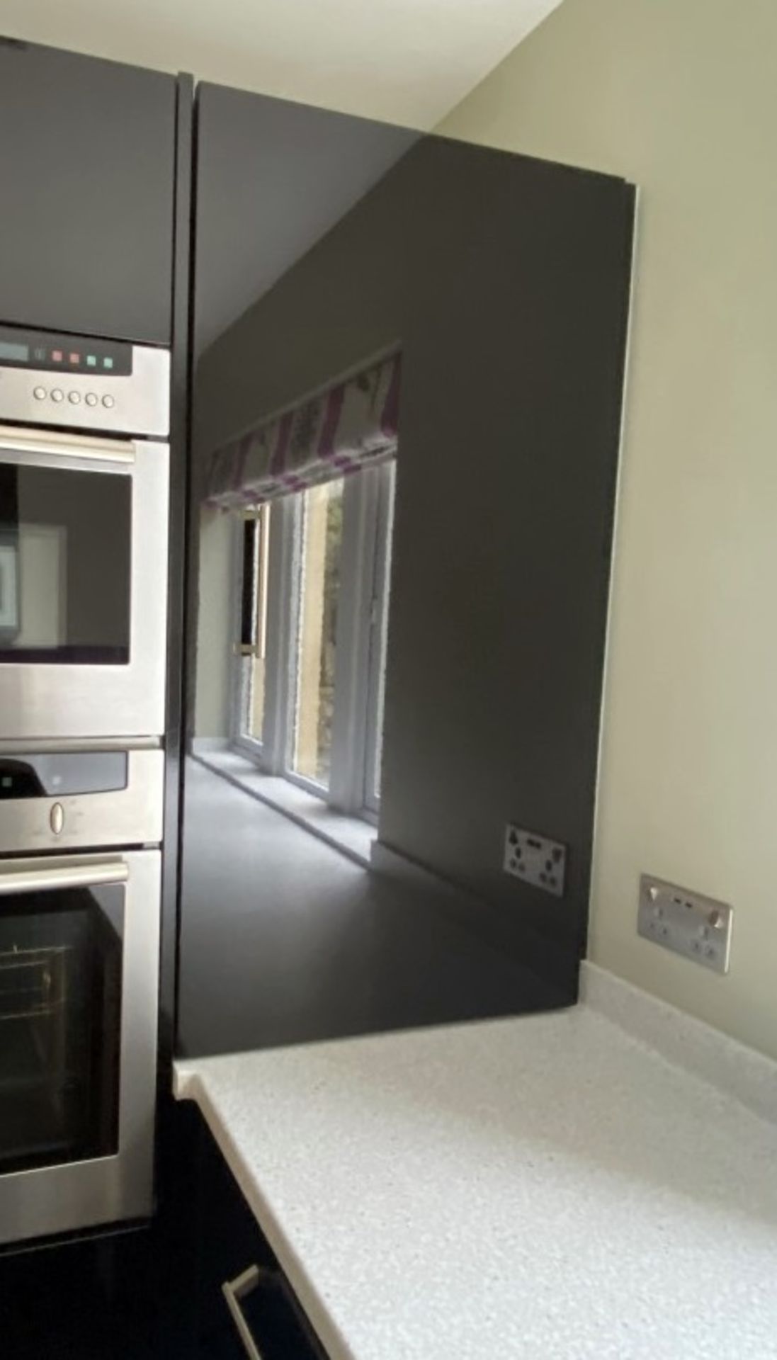 1 x MAGNET Modern Black Gloss Fitted Kitchen With Premium Branded Appliances + Corian Worktops - Image 59 of 62