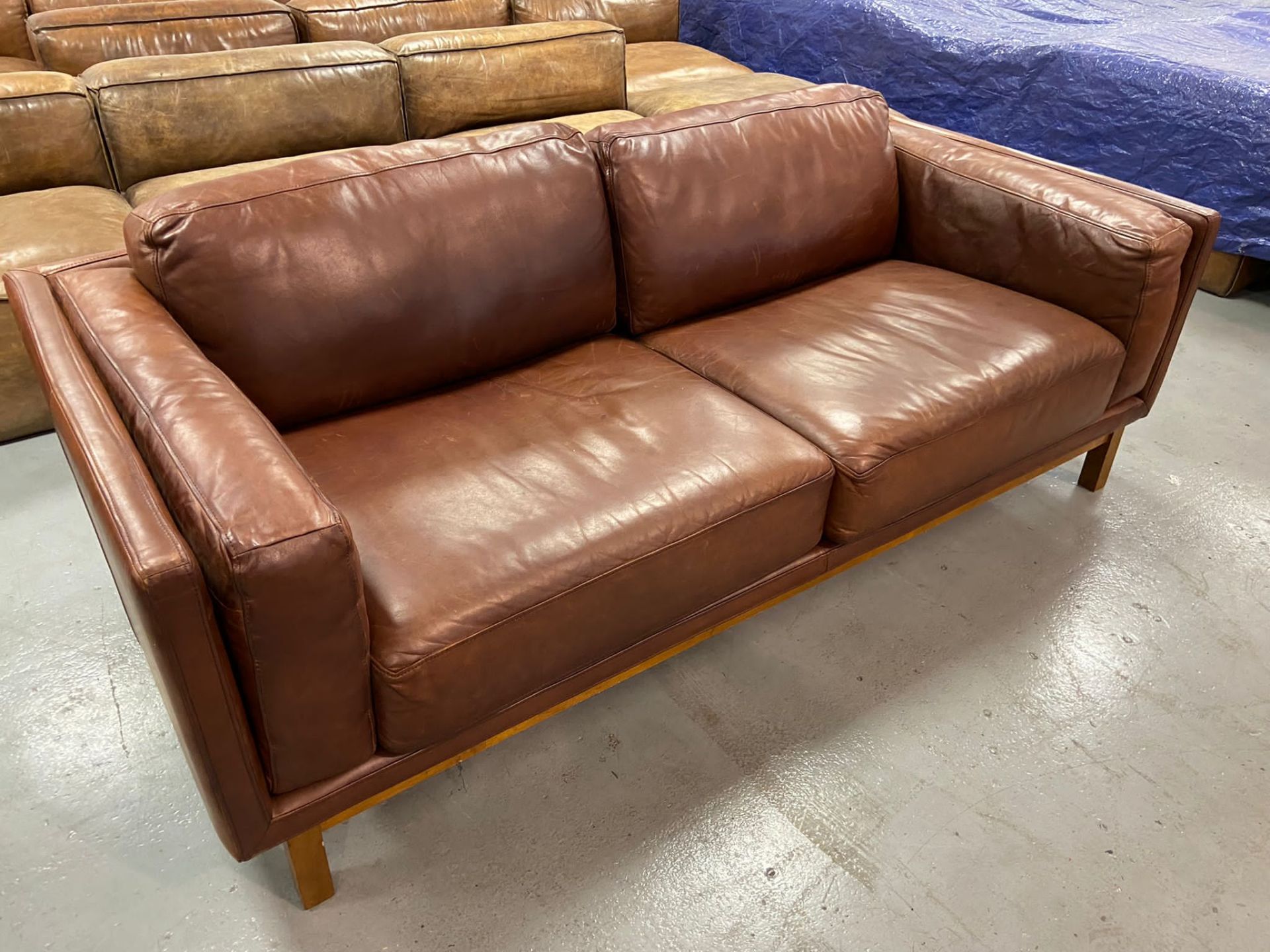 1 x West Elm Dekalb Contemporary Three Seater Sofa - Upholstered in Quality Tan Leather With Oak Fee