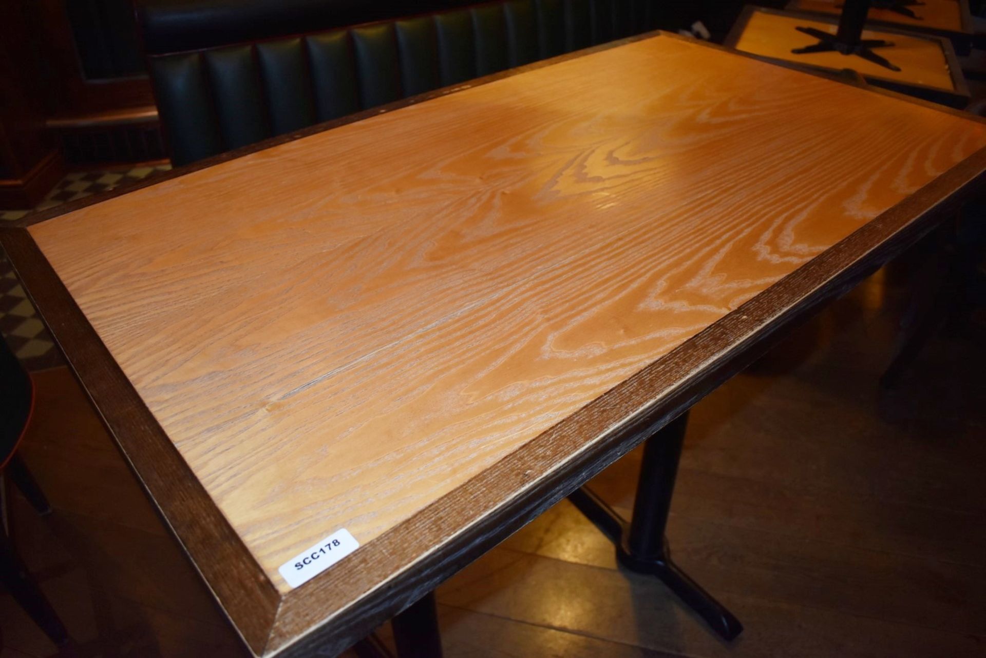 1 x Rectangular Restaurant Poser Table - Seats Upto 4 Persons - Two Tone Wooden Top & Cast Iron Base - Image 3 of 3
