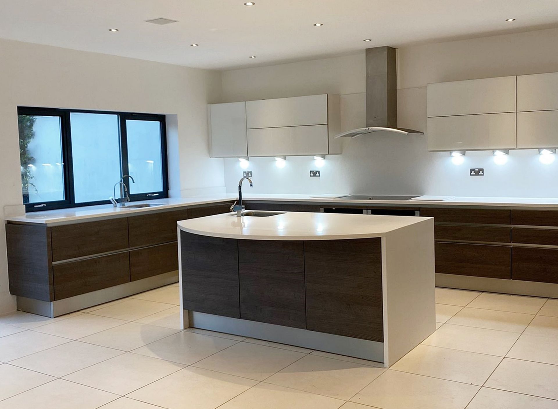 Bespoke Fitted Premium RWK German Kitchen With NEFF Appliances, Corian Worktops And Central Island