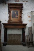 Fireplace in bluestone with wooden upper and trupeau. Origin Antwerp / Plantijn H400x240x70