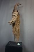Africa mask in wood on base H130