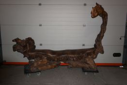 Decorative bench in root wood in the shape of a camel / DROMEDARIS H107X72X250