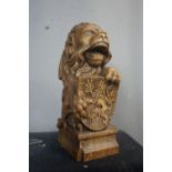 Sculpture in wood, lion with coat of arms H30