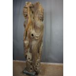 Decorative sculpture in wood with 3 faces