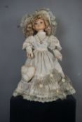 Dressed doll H47