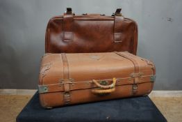 Couple of suitcases in leather and wood