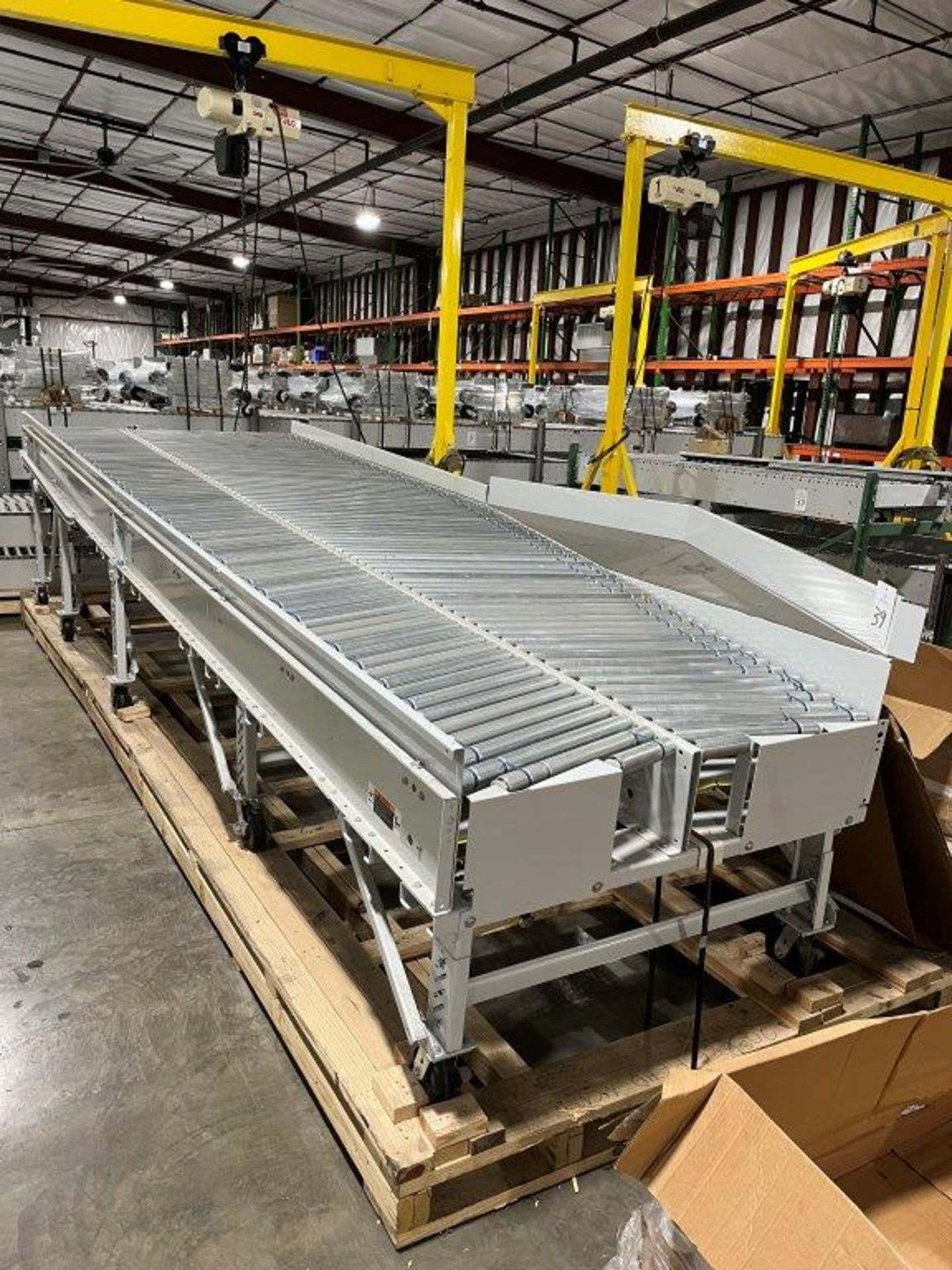 (1) 75" x 20' Herringbone Power Decline Roller Conveyor