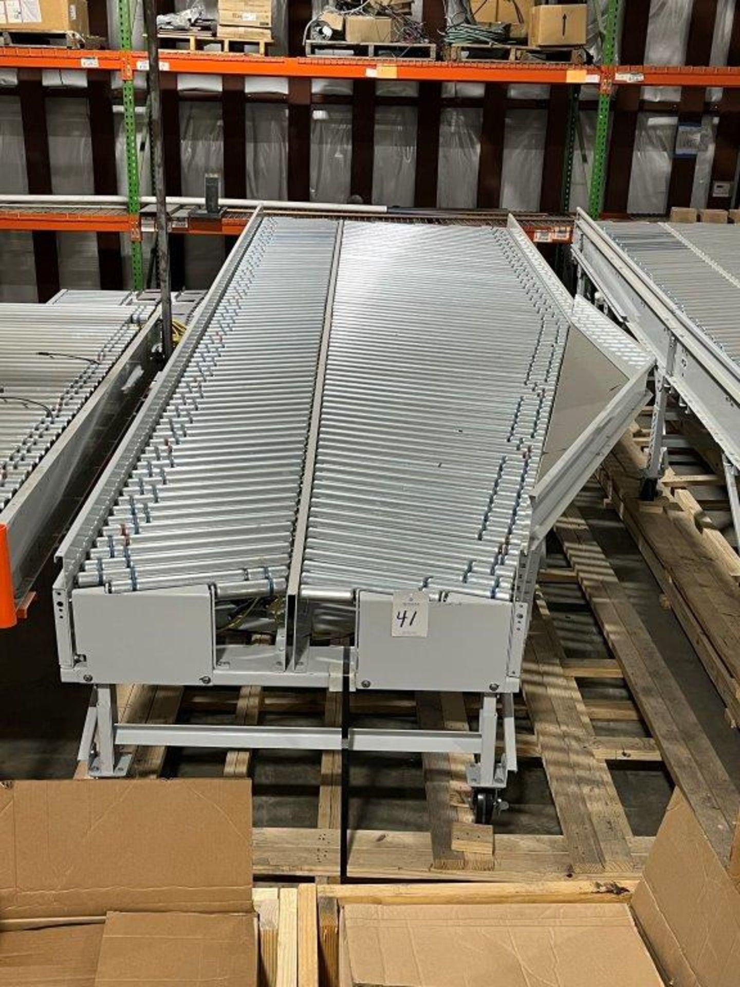(1) 75" x 20' Herringbone Power Decline Roller Conveyor