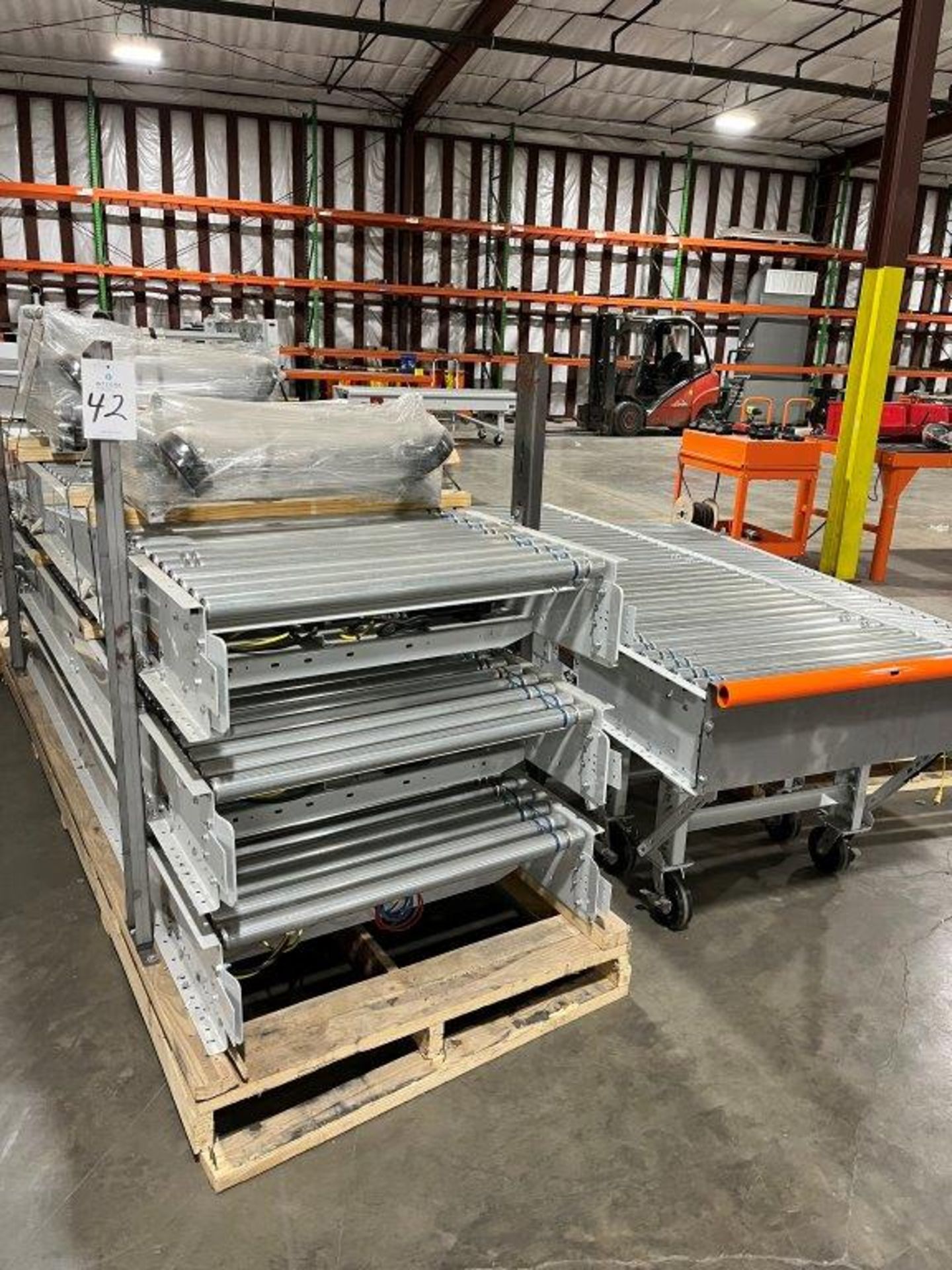 (11) Sections 36" x 10' Power Roller Conveyor