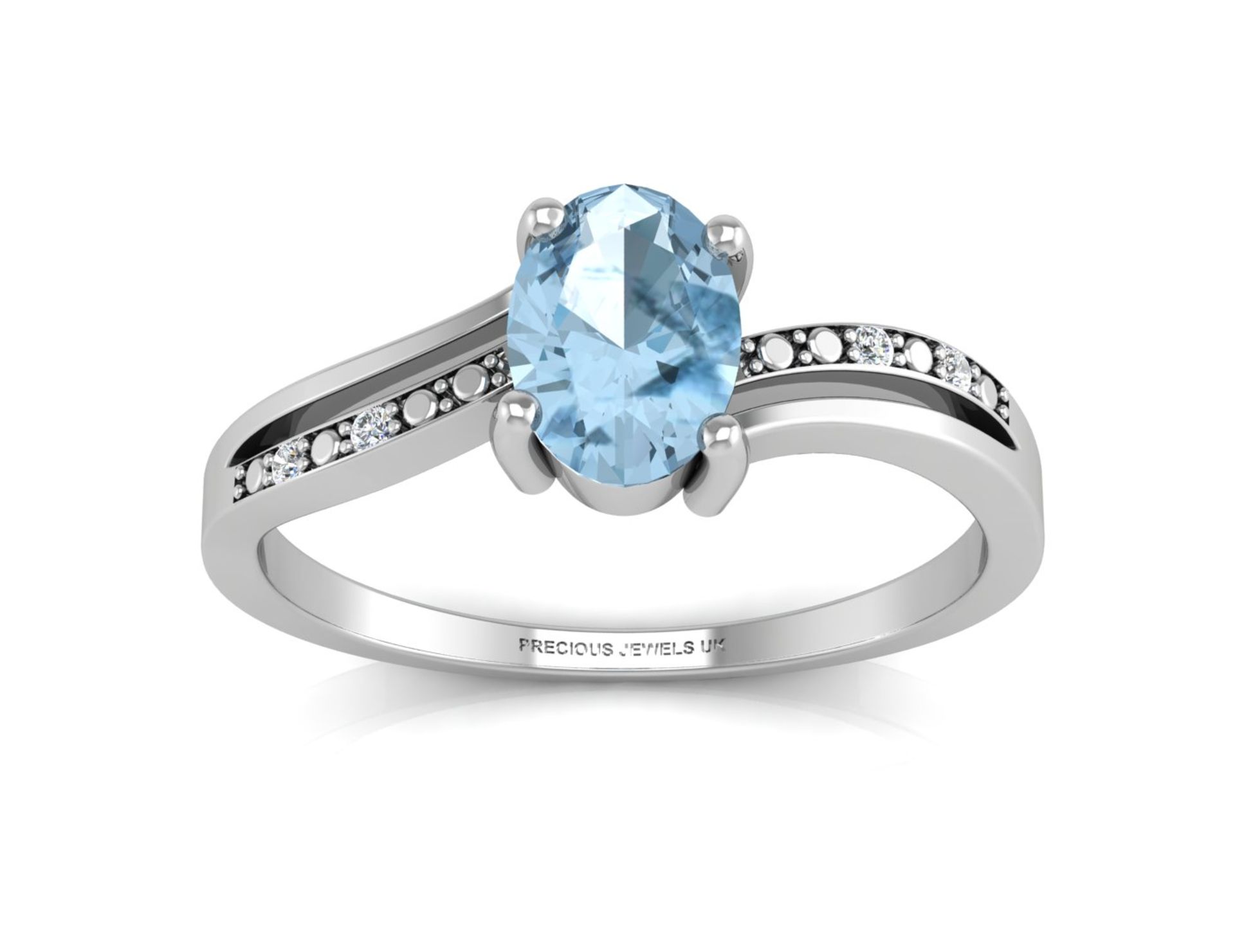 9ct White Gold Diamond And Blue Topaz Ring 0.02 Carats - Valued by GIE £1,070.00 - An oval shaped - Image 3 of 5