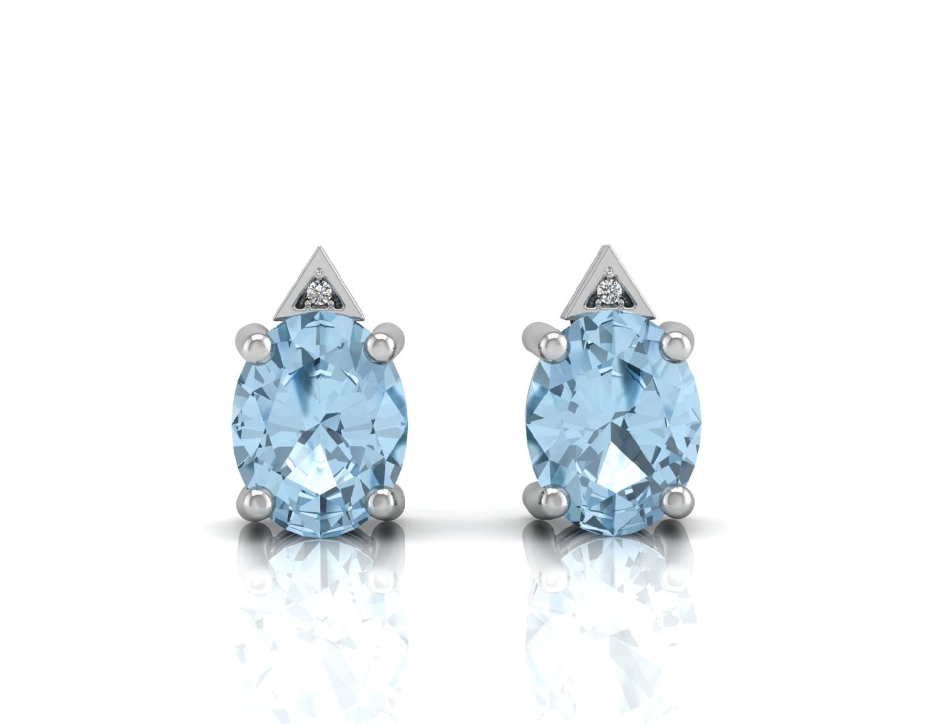 9ct White Gold Diamond And Blue Topaz Earring 0.01 Carats - Valued by GIE £899.00 - A beautiful oval - Image 3 of 4
