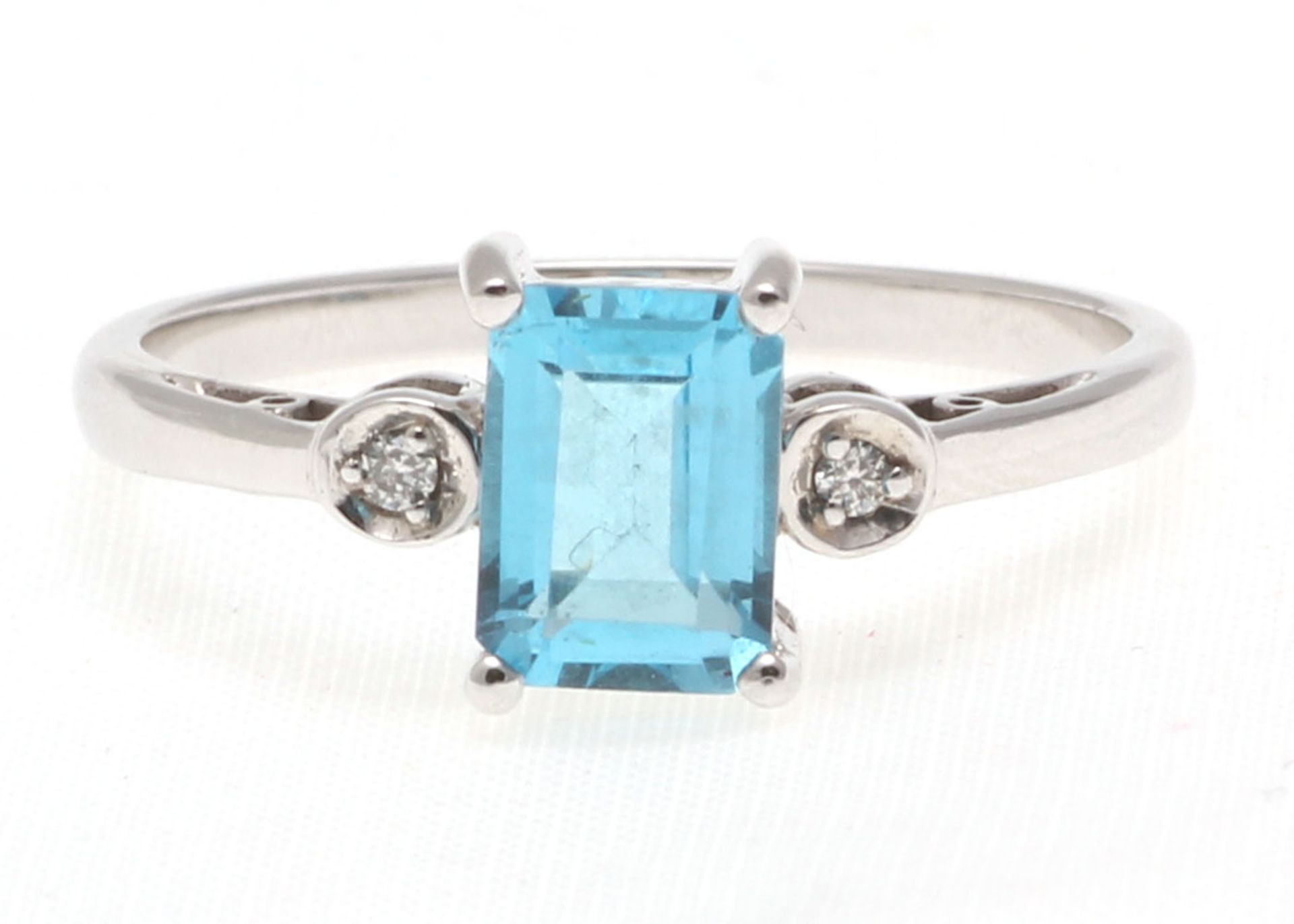9ct White Gold Blue Topaz Diamond Ring 0.02 Carats - Valued by GIE £1,220.00 - An emerald cut Blue
