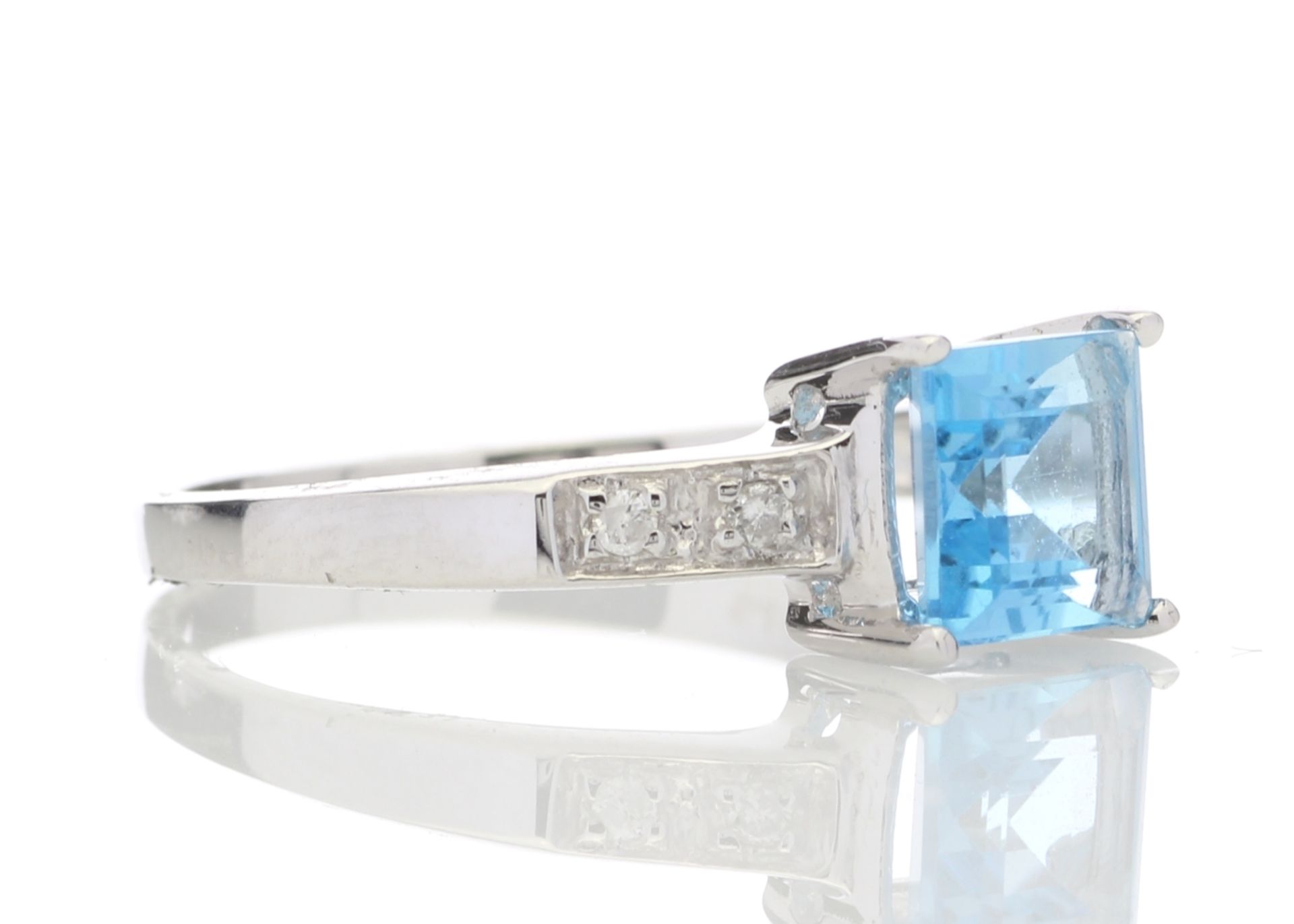 9ct White Gold Diamond And Blue Topaz Ring 0.04 Carats - Valued by GIE £1,170.00 - One square cut - Image 4 of 5