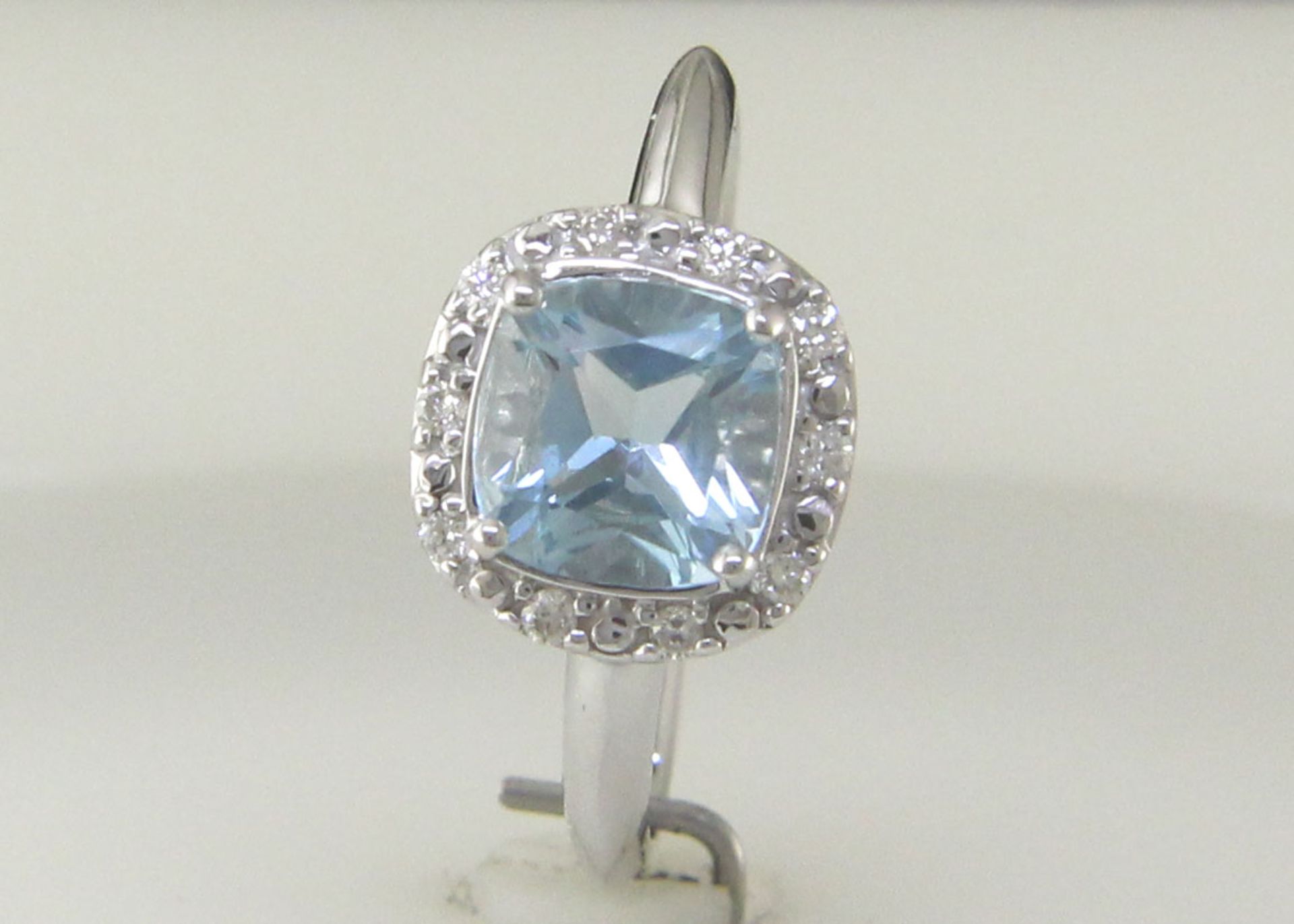 9ct White Gold Diamond And Blue Topaz Ring 0.10 Carats - Valued by GIE £1,920.00 - A stunning - Image 8 of 9