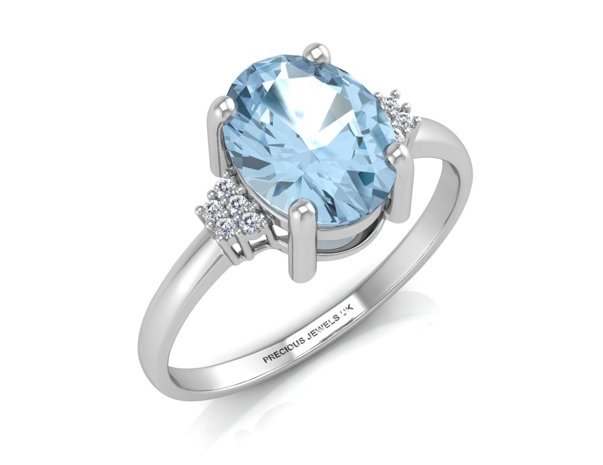 9ct White Gold Diamond And Blue Topaz Ring 0.03 Carats - Valued by GIE £1,145.00 - An oval cut