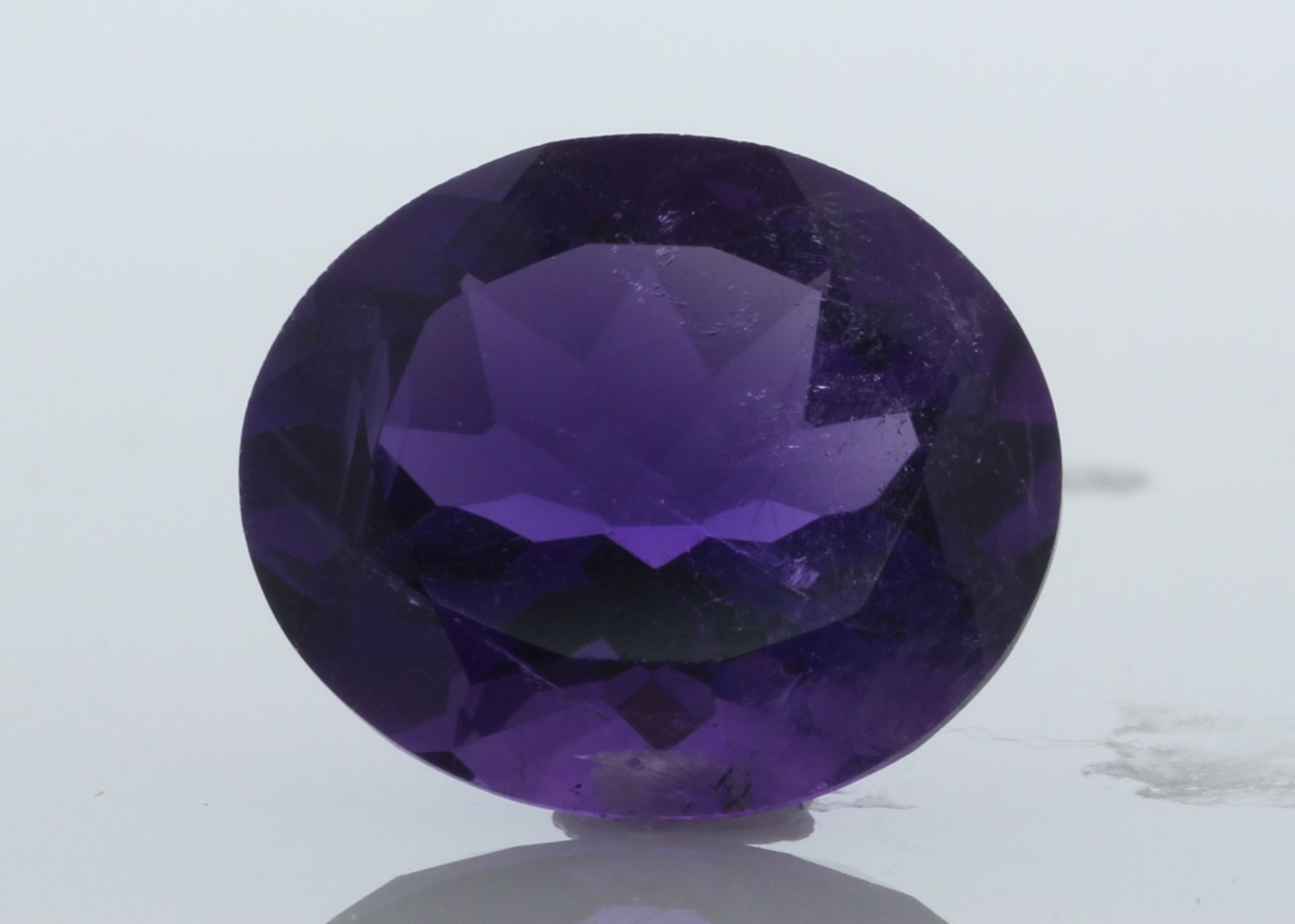Loose Oval Amethyst 6.36 Carats - Valued by AGI £1,590.00 - Loose Oval Amethyst 6.36 Colour-