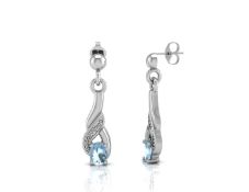 9ct White Gold Diamond And Blue Topaz Earring 0.01 Carats - Valued by AGI £260.00 - A gorgeous