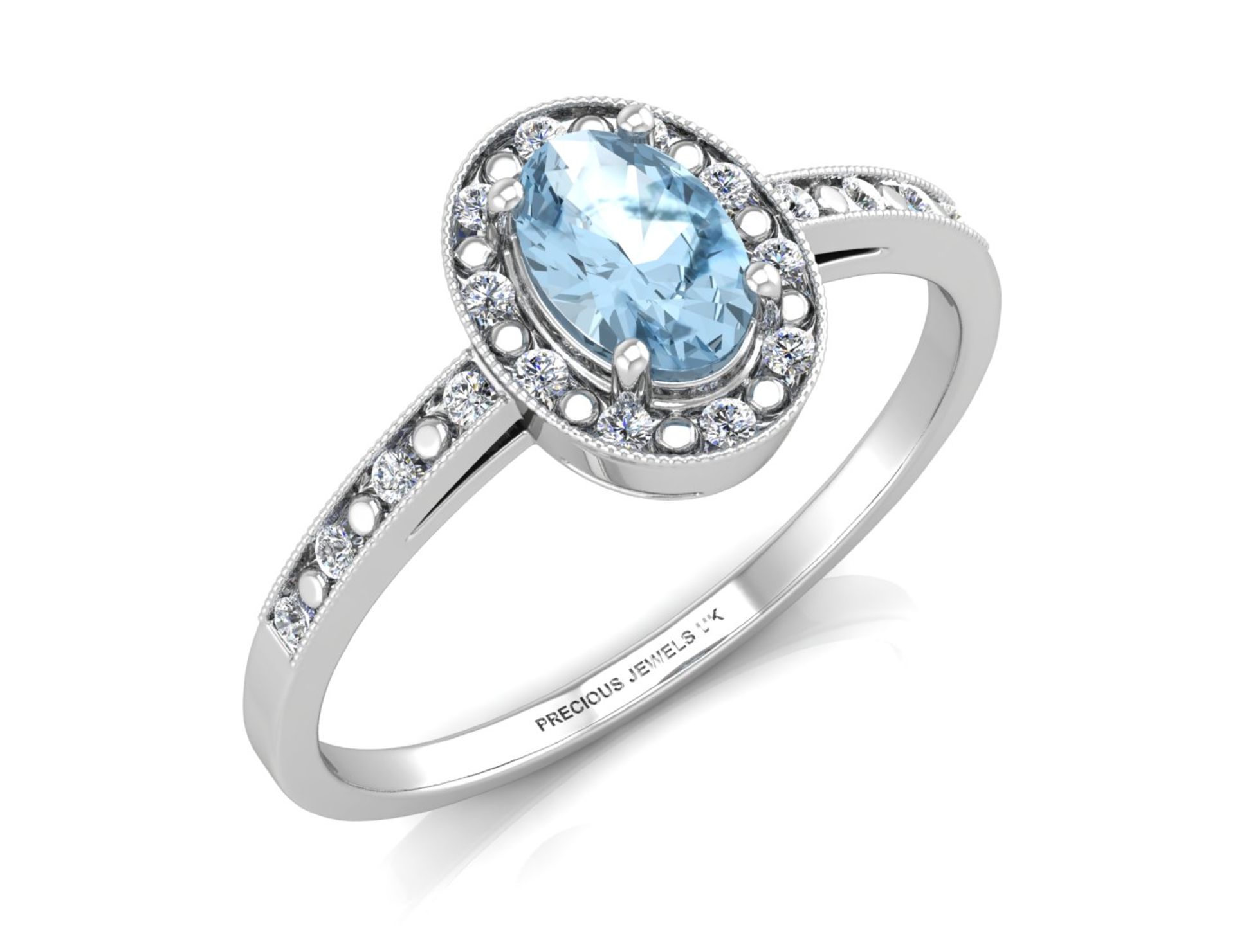 9ct White Gold Oval Cluster Diamond And Blue Topaz Ring 0.09 Carats - Valued by GIE £1,595.00 - A