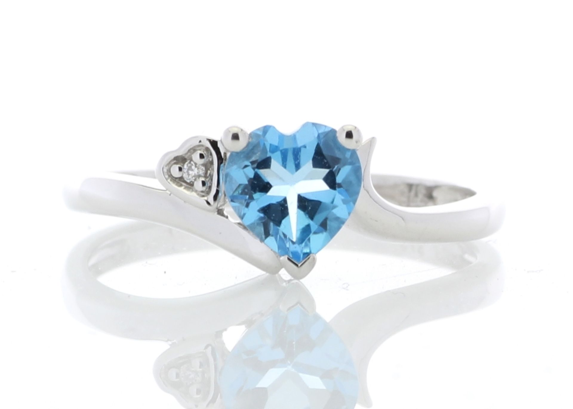 9ct White Gold Diamond and Heart Shaped Blue Topaz Ring 0.01 Carats - Valued by AGI £825.00 - This