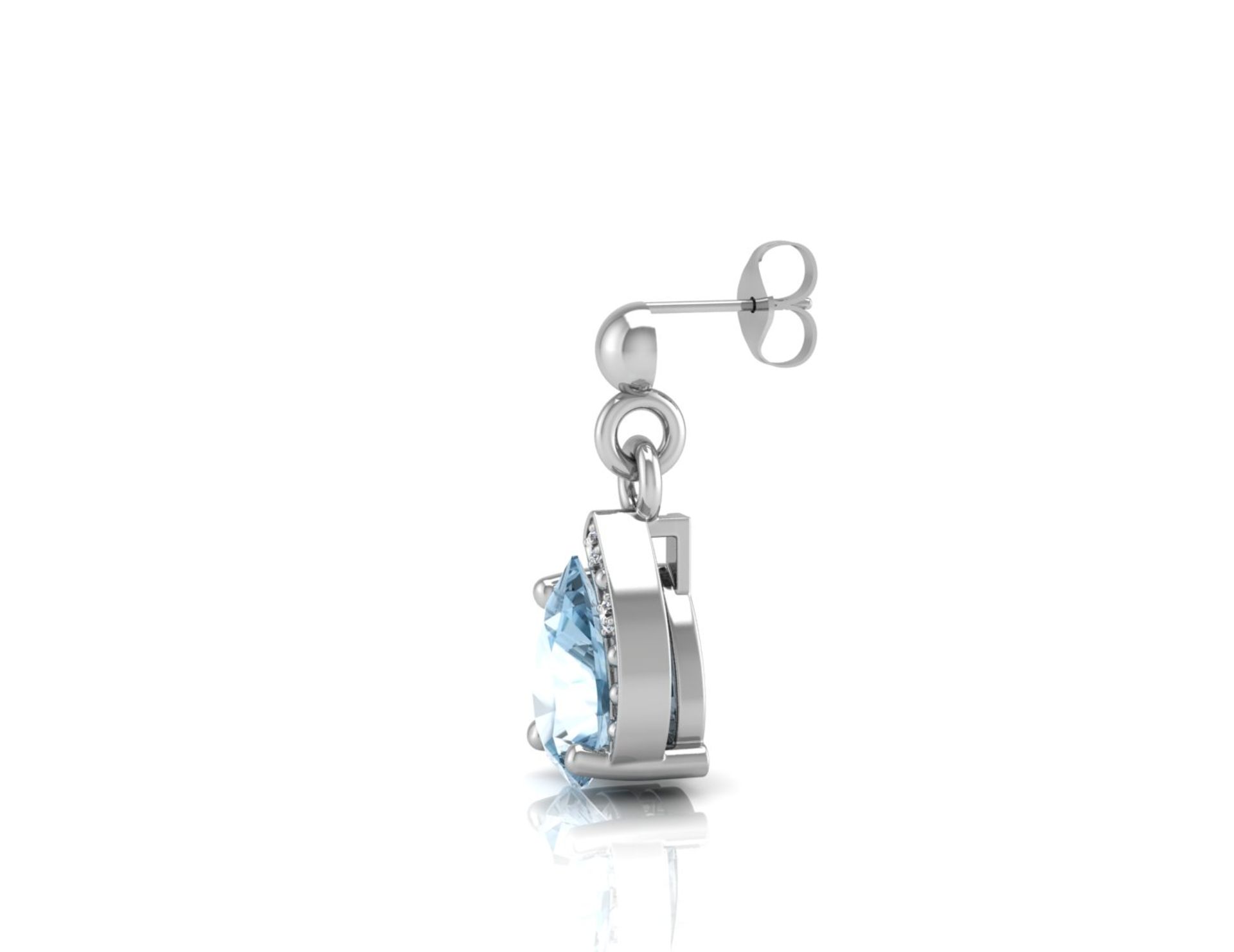 9ct White Gold Diamond And Blue Topaz Earring 0.01 Carats - Valued by AGI £330.00 - 9ct White Gold - Image 2 of 3