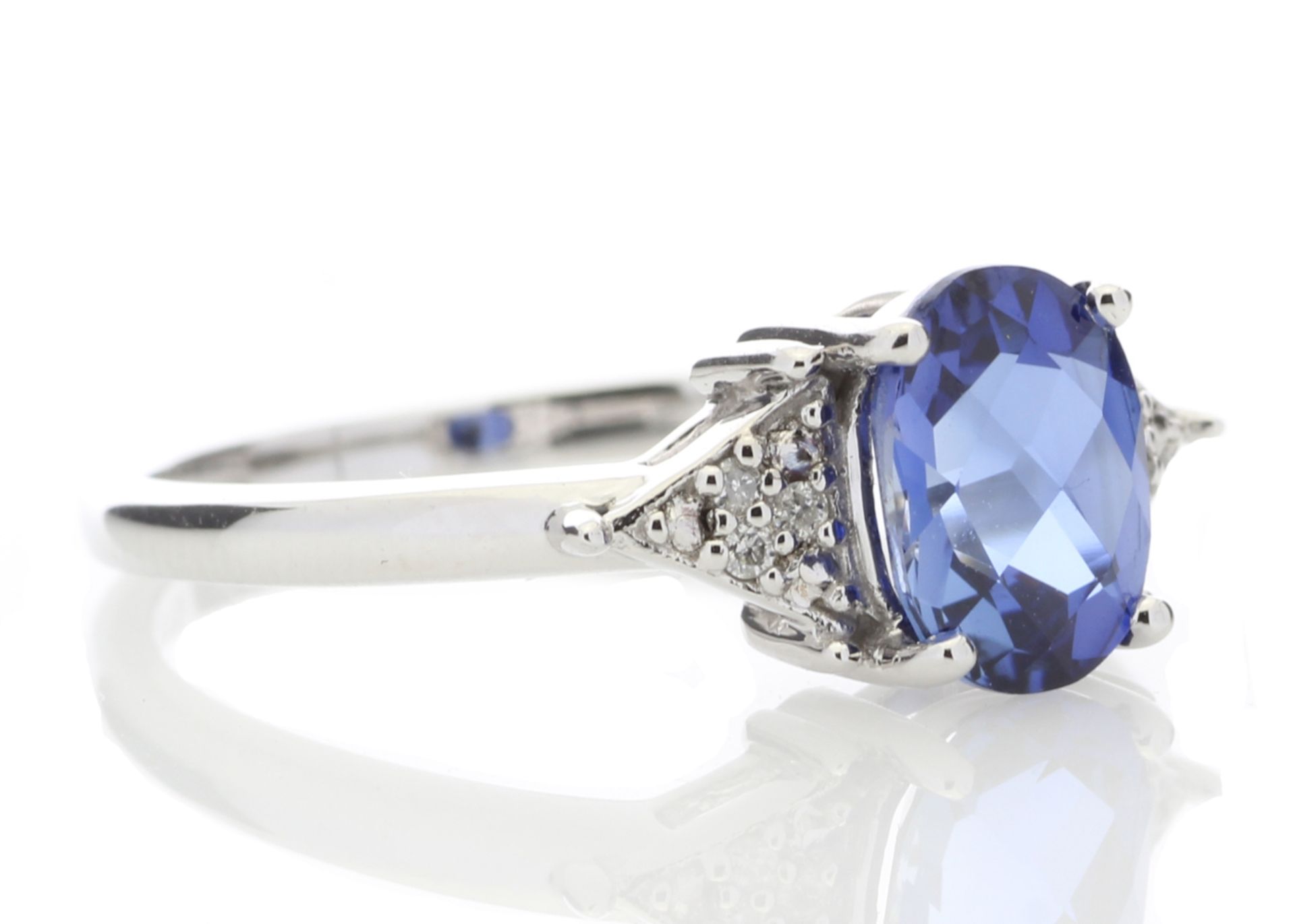 9ct White Gold Created Ceylon Sapphire and Diamond Ring (0.03) 1.67 Carats Carats - Valued by GIE £ - Image 4 of 5