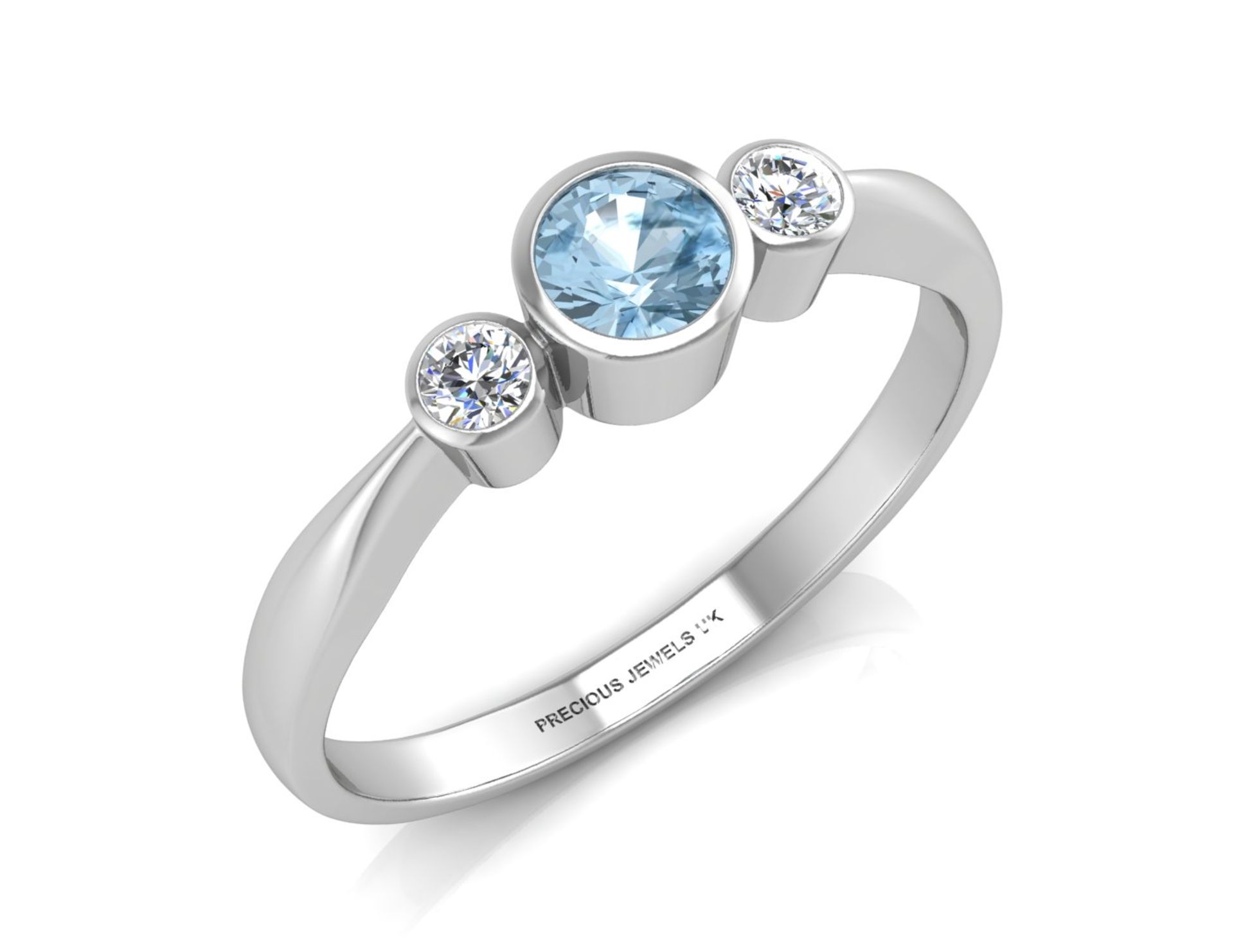 9ct White Gold Three Stone Diamond And Blue Topaz Ring 0.10 Carats - Valued by AGI £990.00 - One