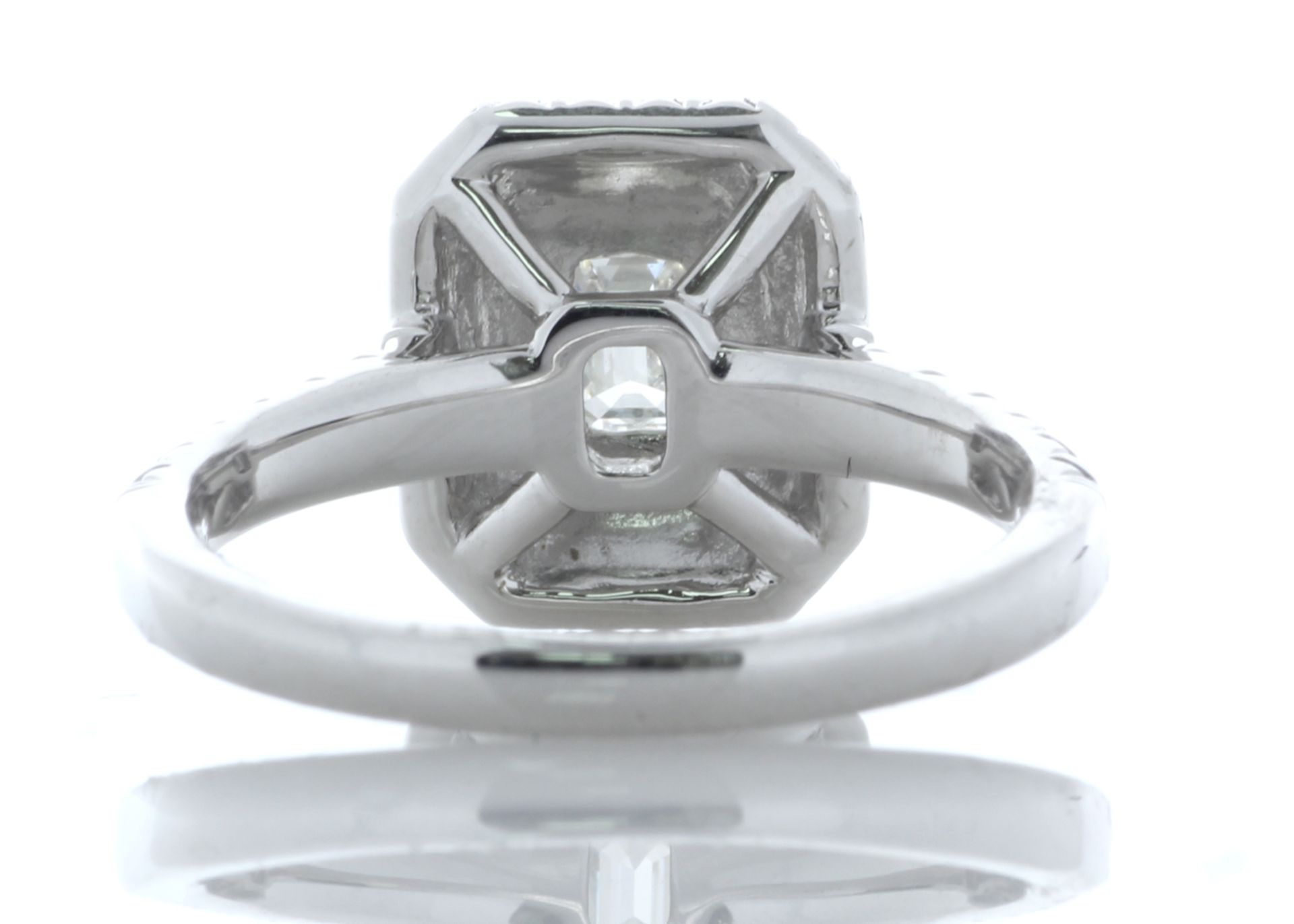 Platinum Single Stone With Halo Setting Ring 0.99 Carats - Valued by AGI £11,600.00 - A modern - Image 3 of 4