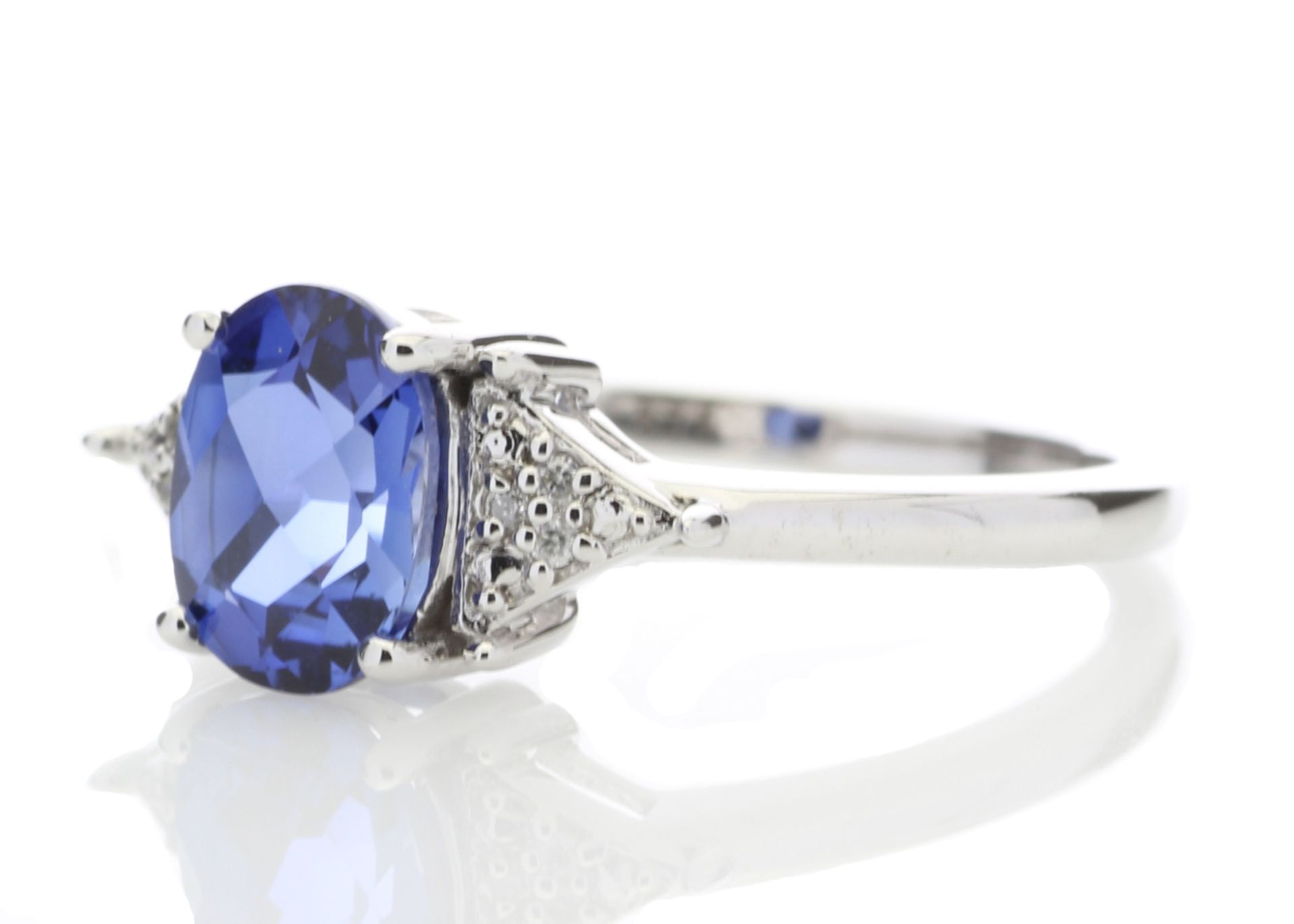 9ct White Gold Created Ceylon Sapphire and Diamond Ring (0.03) 1.67 Carats Carats - Valued by GIE £ - Image 2 of 5